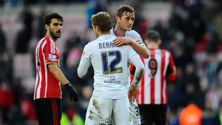  Late chances: Gaetano Berardi embraces captain Liam Cooper after his injury-time header hit the post. 