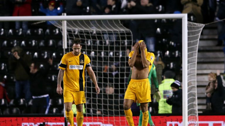 Southport players react after conceding a goal during the FA Cup Third Round match between Derby County and Southport FC at i