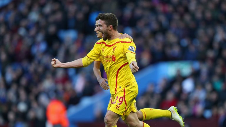 Fabio Borini of Liverpool celebrates scoring their first goal during the Barclays Premier League match between Aston Villa and Liverpool