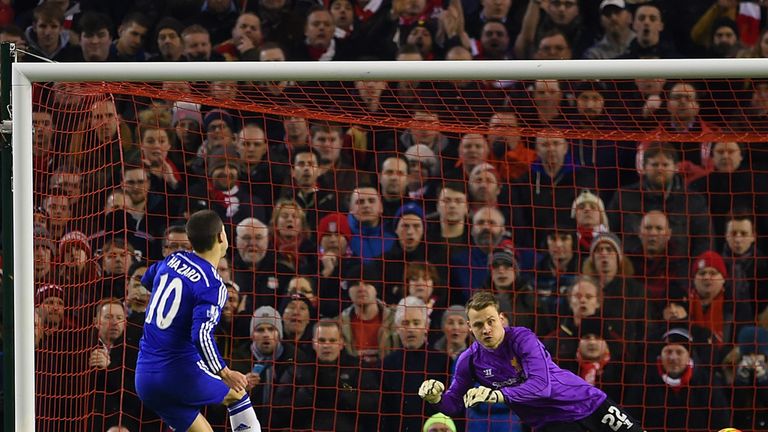 Eden Hazard of Chelsea scores the opening goal past Simon Mignolet of Liverpool from the penalty spot during the Capital One Cup semi-final