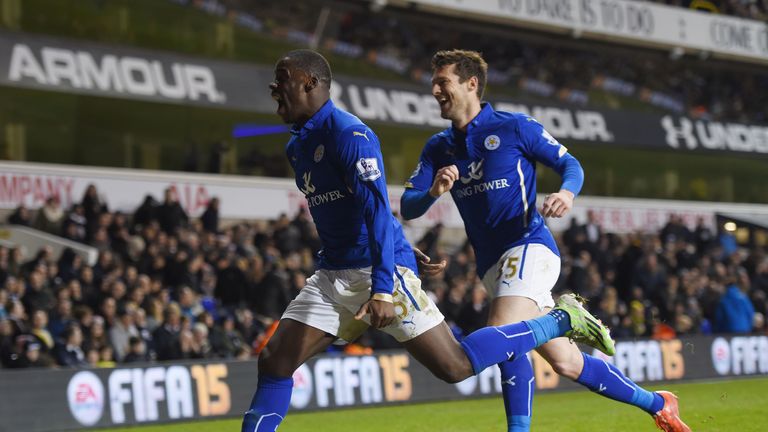 Jeffrey Schlupp of Leicester City celebrates with teammate David Nugent of Leicester City after scoring his team's sec