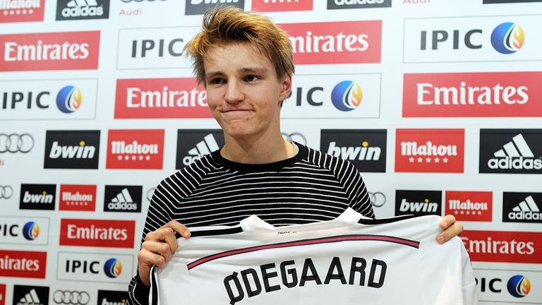 Martin Odegaard with his Real Madrid shirt