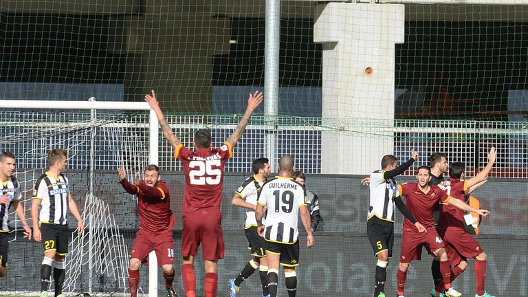 Roma celebrate Astori's controversial goal v Udinese
