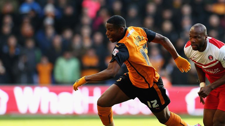 Benik Afobe gets away from Andre Bikey