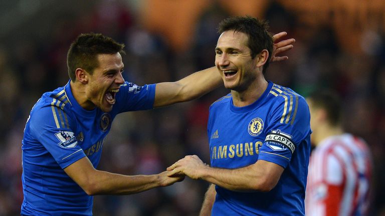 Chelsea's Spanish defender Cesar Azpilicueta (L) and Chelsea's English midfielder Frank Lampard (R) react after Stoke's second own goal during the English 