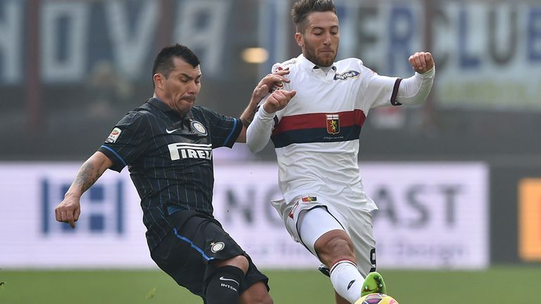 Gary Medel of Inter competes with Andrea Bertolacci of Genoa 