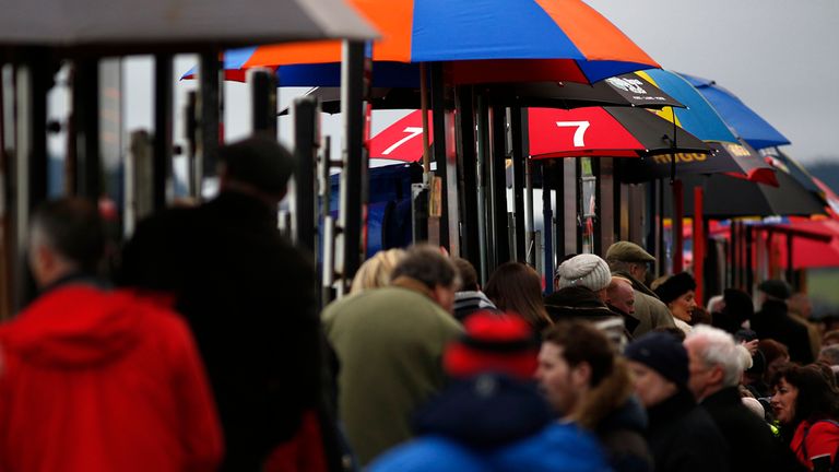 DUBLIN, IRELAND - JANUARY 25: Busy bookmakers at Leopardstown racecourse.