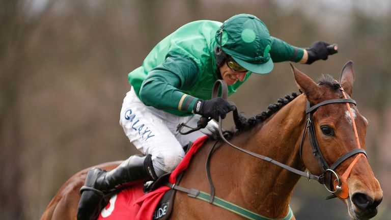 ESHER, ENGLAND - JANUARY 31:  Daryl Jacob riding Gitane Du Berlais clear the last to win The Betfred TV Scilly Isles Novices' Steeple Chase at Sandown.