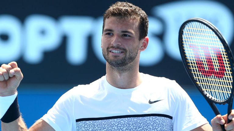 Grigor Dimitrov celebrates winning his third round match against Marcos Baghdatis during day five of the 2015 Australian Open
