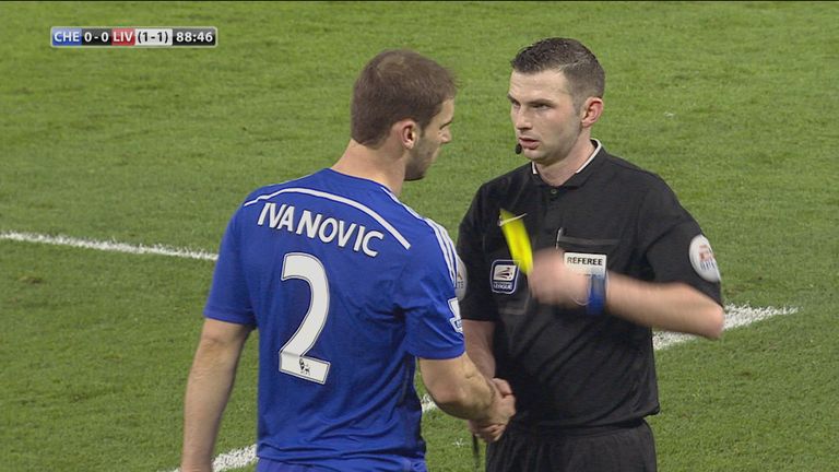 Branislav Ivanovic shakes the ref's hand after being booked.
