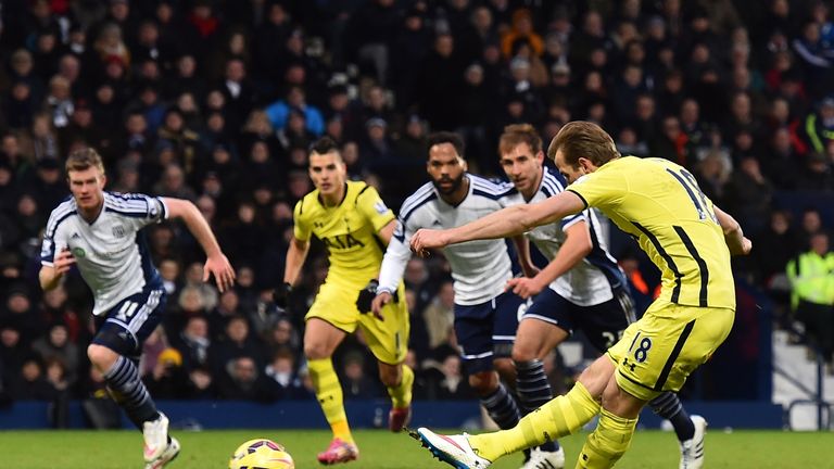 Tottenham Hotspur striker Harry Kane scores from the penalty spot for their third goal during the match between West Bromwich Albion and Tottenham Hotspur