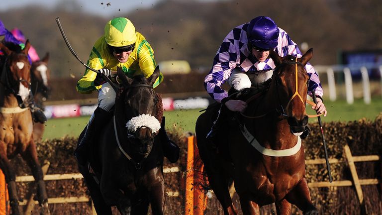 Intense Tango ridden by Brian Hughes (right) goes ahead after the final hurdle to win the OLBG. com Mares Hurdle Race during day two of the Sky Bet Chase W