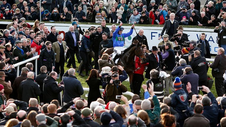 DUBLIN, IRELAND - JANUARY 25:   Ruby Walsh riding Hurricane Fly celebrates success in The BHP Insurances Irish Champion Hurdle at Leopardstown.