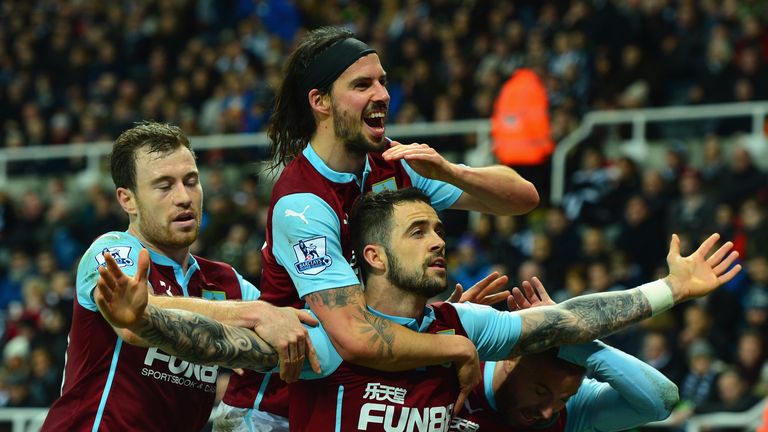 NEWCASTLE UPON TYNE, ENGLAND - JANUARY 01:  Danny Ings of Burnley celebrates scoring their second goal with team mates during the Barclays Premier League m