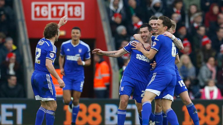  Darren Ambrose of Ipswich celebrates with teammates after scoring the opening goal