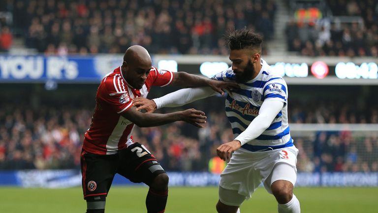 Jamal Campbell-Ryce tries to get past Armand Traore 
