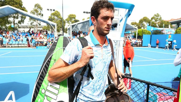 James Ward leaves the court after losing in his first round match against Fernando Verdasco