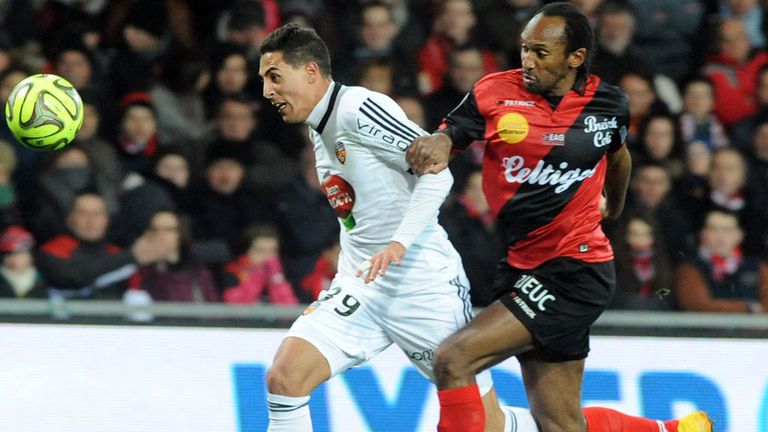 Guingamp's defender Jeremy Sorbon vies with Lorient's Cheick Doukoure