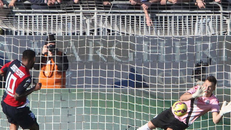 Joao Pedro takes a penalty for Cagliari