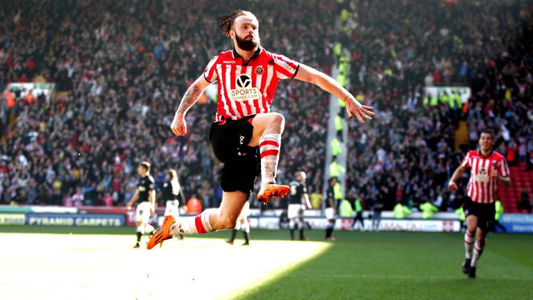 Sheffield United's John Brayford celebrates scoring their second goal during the FA Cup Sixth Round match at Bramall Lane, Sheffield.