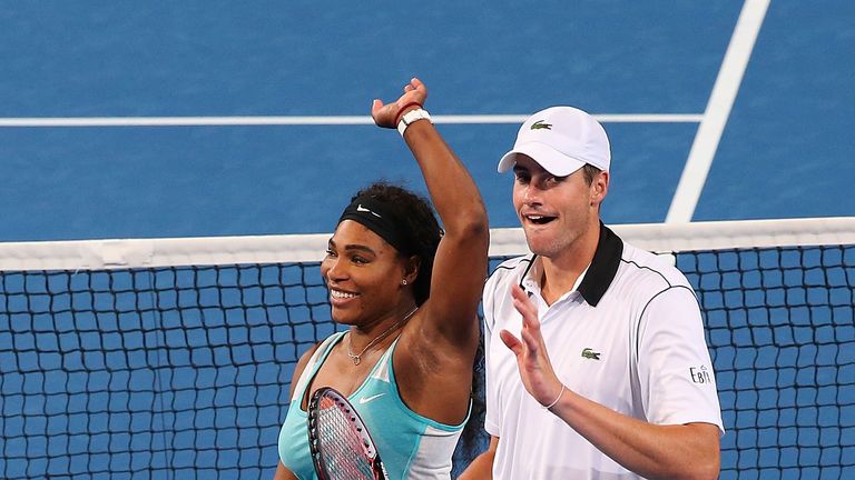 Serena Williams and John Isner of the United States celebrate winning their mixed doubles match at Hopman Cup.