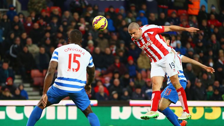 Jonathan Walters heads in Stoke City's third goal for a hattrick during the match against Queens Park Ranger