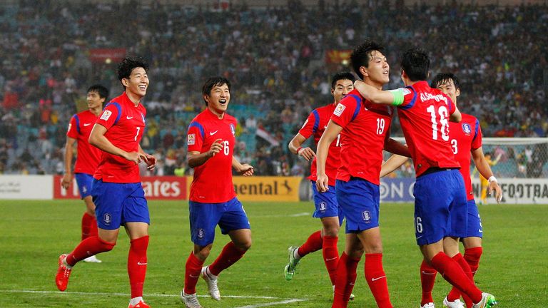 SYDNEY, AUSTRALIA - JANUARY 26:  Kim Young Gwon of Korea Republic celebrates with team mates after scoring a goal during the Asian Cup Semi Final match bet