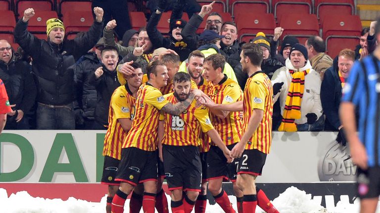 Kris Doolan (centre) is mobbed after scoring Partick' second