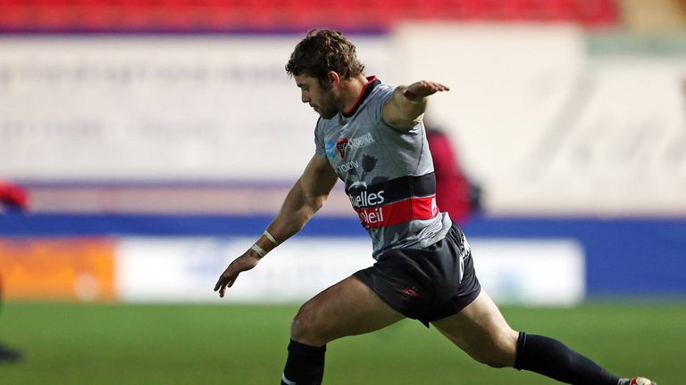 Toulon's Welsh full back Leigh Halfpenny kicks a conversion during the European Rugby Champions Cup rugby union match between Llanelli Scarlets and Toulon