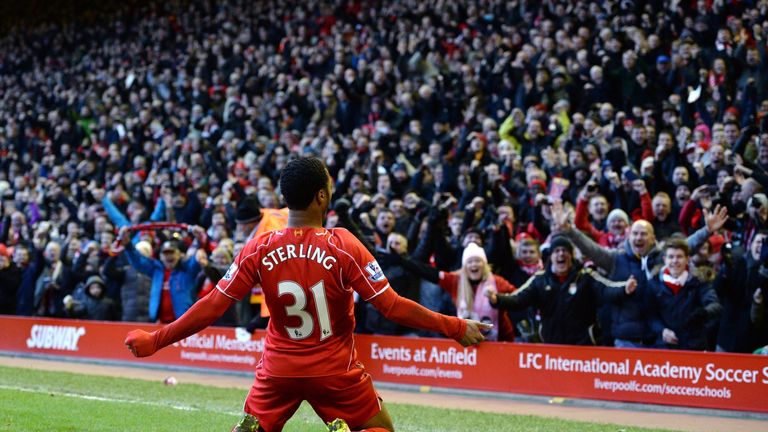 Liverpool's English midfielder Raheem Sterling celebrates scoring the opening goal against West Hamn