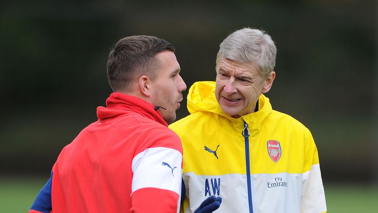 Lukas Podolski and Arsene Wenger, Arsenal training, December 2014