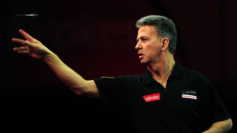 Sweden's Magnus Caris in action during the Ladbrokes.com World Darts Championship at Alexandra Palace, London in December 2012