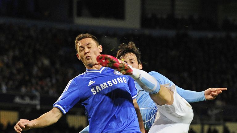 Manchester City's Spanish midfielder David Silva vies for the ball against Chelsea's Serbian footballer Nemenja Matic