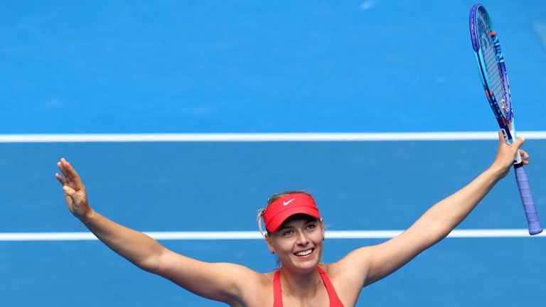 Maria Sharapova of Russia celebrates winning her semifinal match against Ekaterina Makarova of Russia 