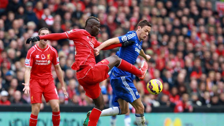 Liverpool's Mario Balotelli (left) and Chelsea's Nemanja Matic battle for the ball at Anfield