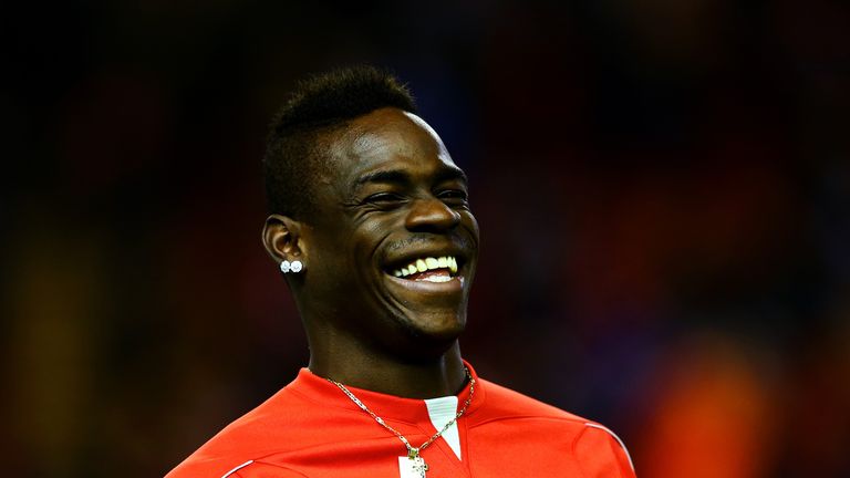 Mario Balotelli of Liverpool smiles during the warm-up for the Barclays Premier League match between Liverpool and Swansea