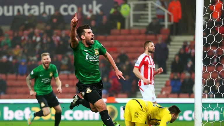 Mark Carrington of Wrexham celebrates after scoring the opening goal during the FA Cup Third Round match between Stoke