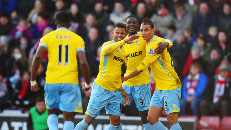 Marouane Chamakh of Crystal Palace (R) celebrates with Wilfried Zaha (L), Fraizer Campbell (2L) and Yaya Sanogo (2R) as he scores their equaliser