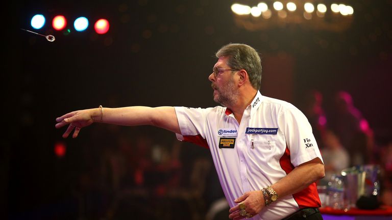  Martin Adams in action during his quarter final match against Ross Montgomery at the BDO World Championships