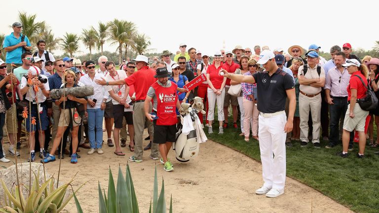 Trouble for Martin Kaymer at the ninth, where he is forced to take a penalty drop after a wayward drive