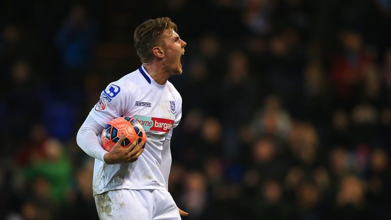 Max Power of Tranmere celebrates scoring his goal during the FA Cup Third Round match between Tranmere Rovers and Swansea City
