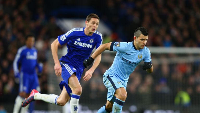 Sergio Aguero of Manchester City breaks away from Nemanja Matic of Chelsea