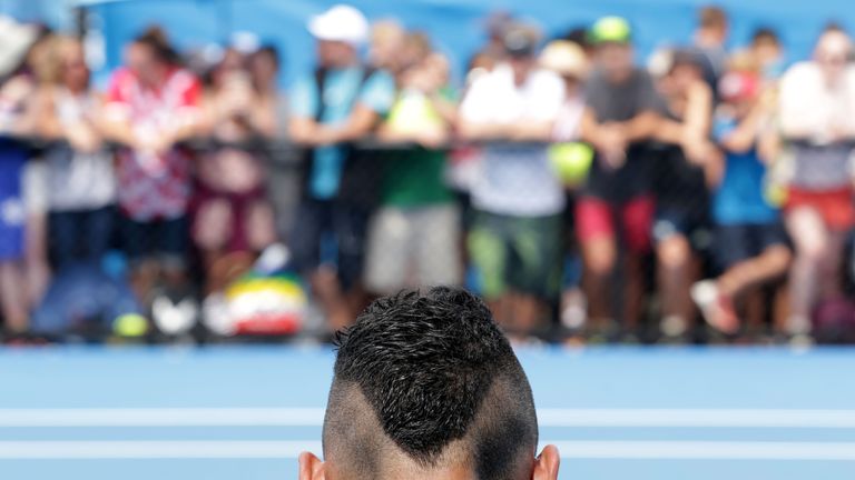 Nick Kyrgios of Australia looks on during a practice session during day two 
