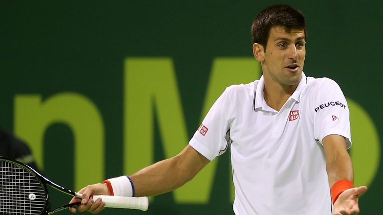 Serbian tennis player Novak Djokovic reacts  during the quarter-finals tennis match against Ivo Karlovic of Croatia in Qatar's ExxonMobil Open in Doha