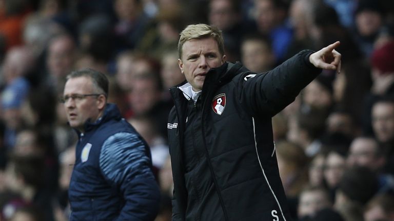Villa manager Paul Lambert Eddie Howe of Bournemouth watch from the sidelines.n