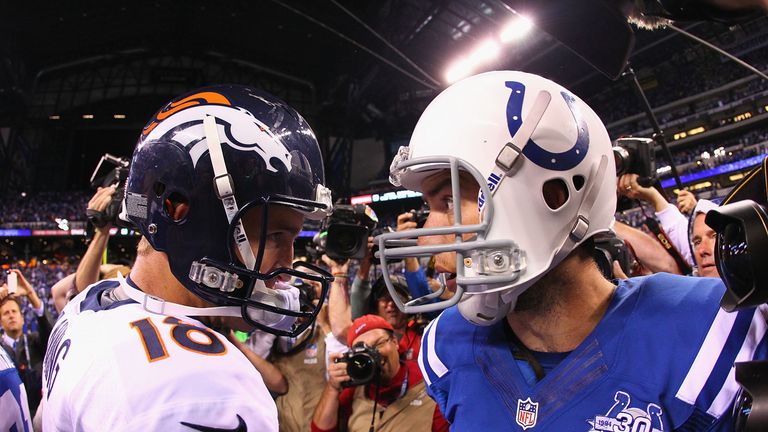 Peyton Manning #18 of the Denver Broncos congratulates Andrew Luck #12 of the Indianapolis Colts after the Colts beat the Br