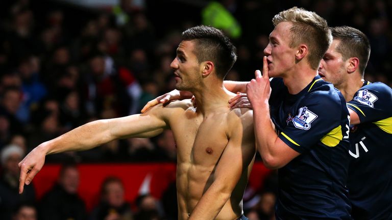 Dusan Tadic of Southampton celebrates with team-mates after scoring against Manchester United