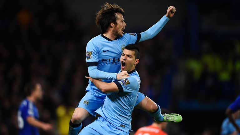 LONDON, ENGLAND - JANUARY 31: Goalscorer David Silva of Manchester City (L) celebrates with teammate Sergio Aguero after scoring against Chelsea