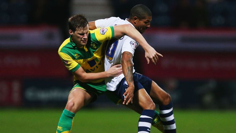 Jermaine Beckford of Preston North End holds off Ryan Bennett of Norwich City during the FA Cup Third Round match