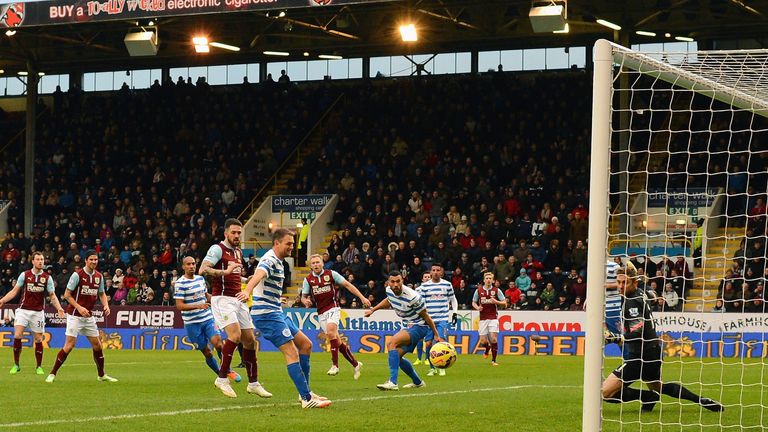Scott Arfield of Burnley scores the opening goal during the Barclays Premier League match between Burnley and QPR